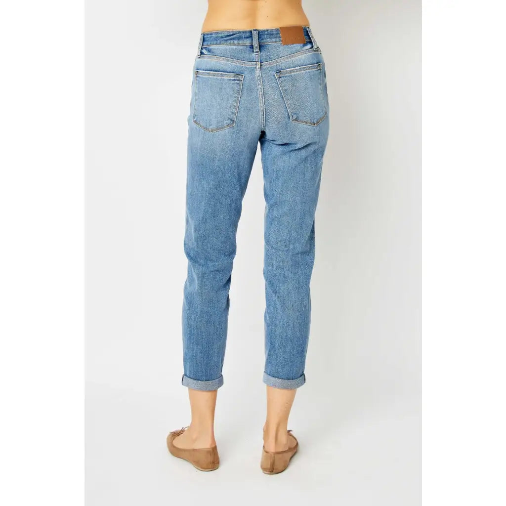 Elevate your denim game with our Best Eva Cuffed Hem Slim Fit Judy Blue Jeans. The cropped cuffed hem detail adds