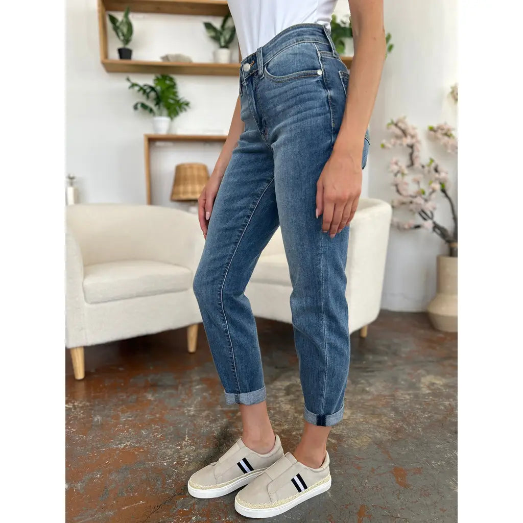Elevate your denim game with our Best Eva Cuffed Hem Slim Fit Judy Blue Jeans. The cropped cuffed hem detail adds