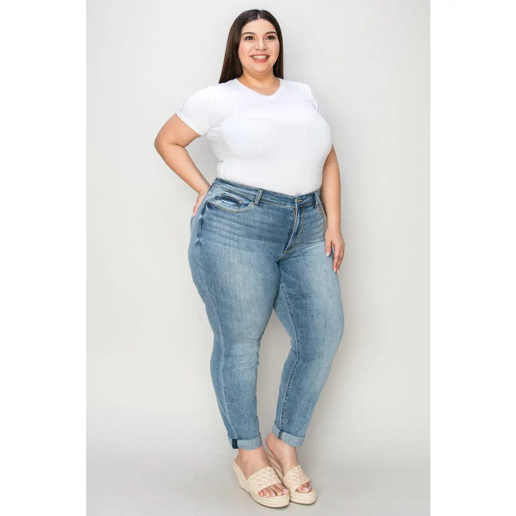 Elevate your denim game with our Best Eva Cuffed Hem Slim Fit Judy Blue Jeans. The cropped cuffed hem detail adds