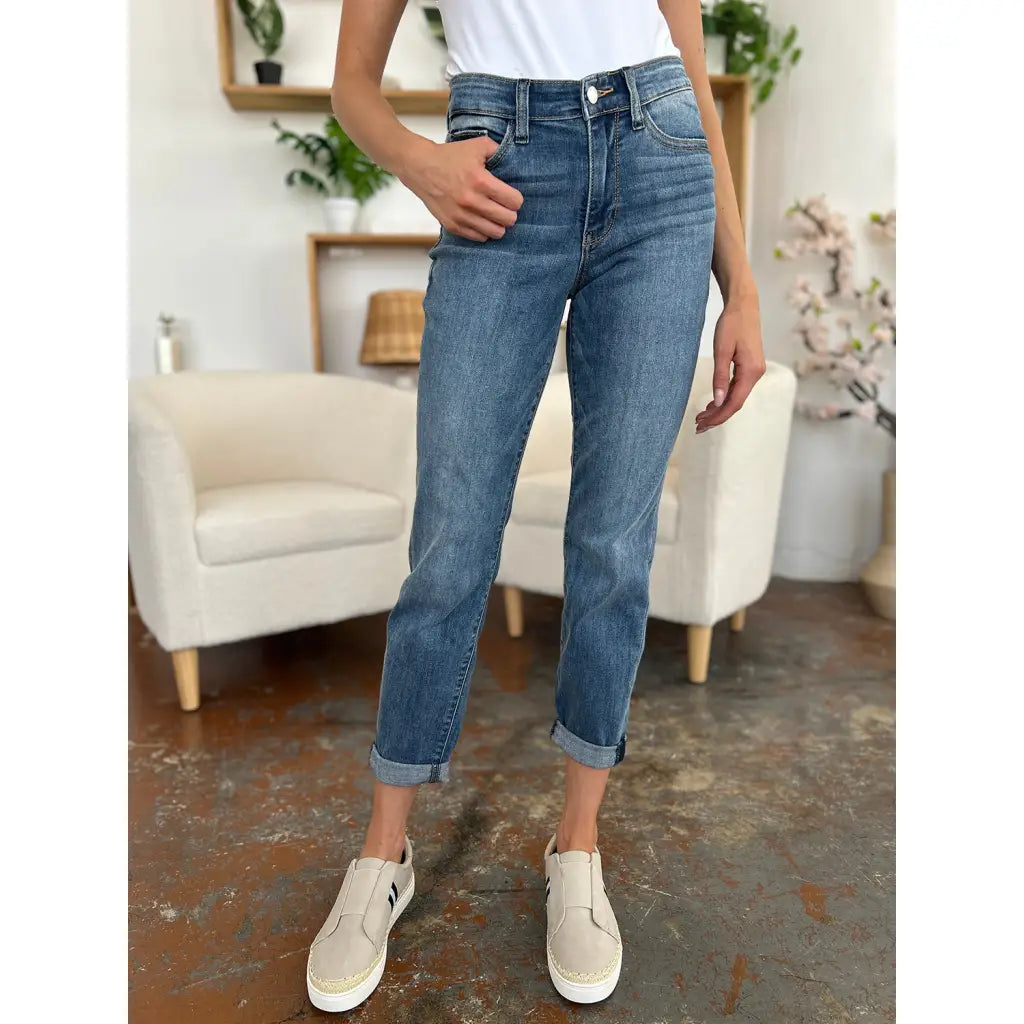 Elevate your denim game with our Best Eva Cuffed Hem Slim Fit Judy Blue Jeans. The cropped cuffed hem detail adds