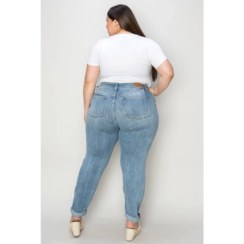 Elevate your denim game with our Best Eva Cuffed Hem Slim Fit Judy Blue Jeans. The cropped cuffed hem detail adds