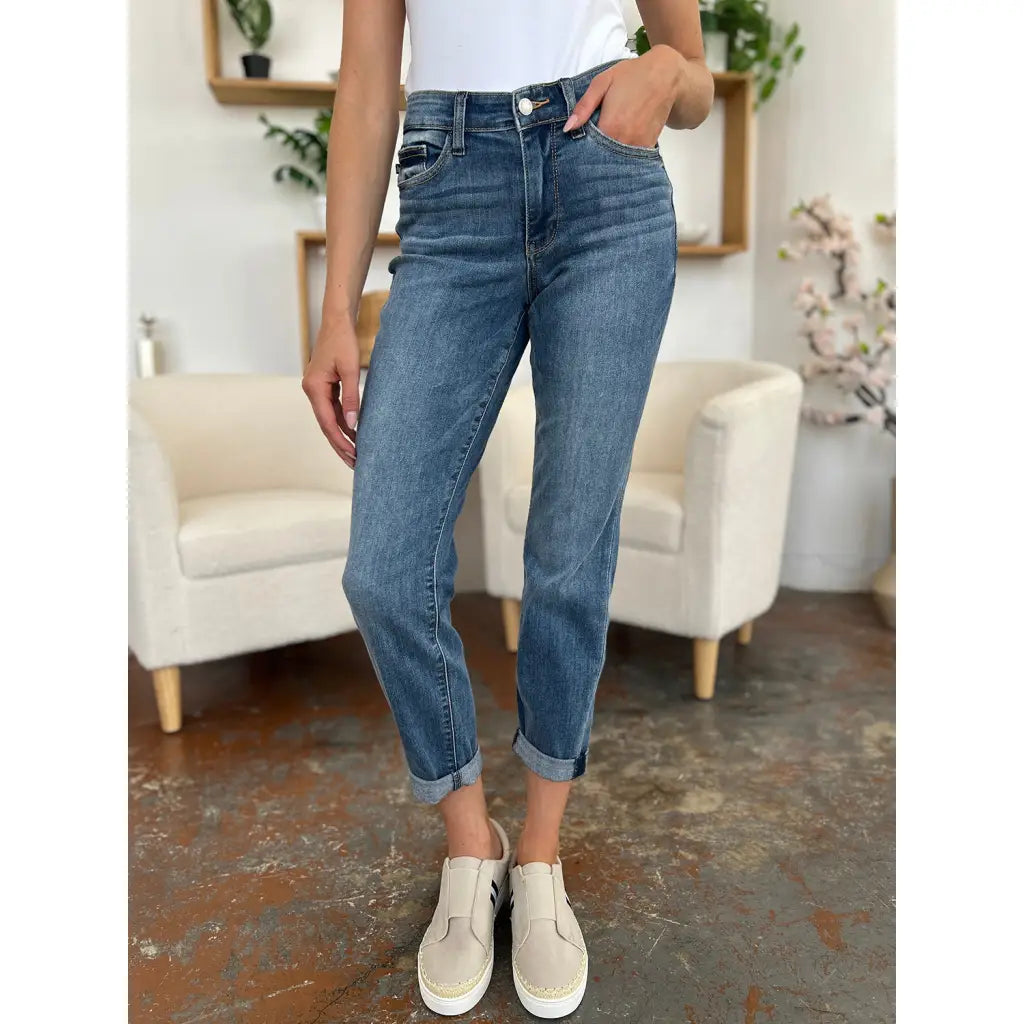 Elevate your denim game with our Best Eva Cuffed Hem Slim Fit Judy Blue Jeans. The cropped cuffed hem detail adds