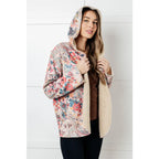 Stay cozy and stylish with our Bestie Floral Sherpa Lined Hooded Jacket! The perfect layer for chilly days this hoodie
