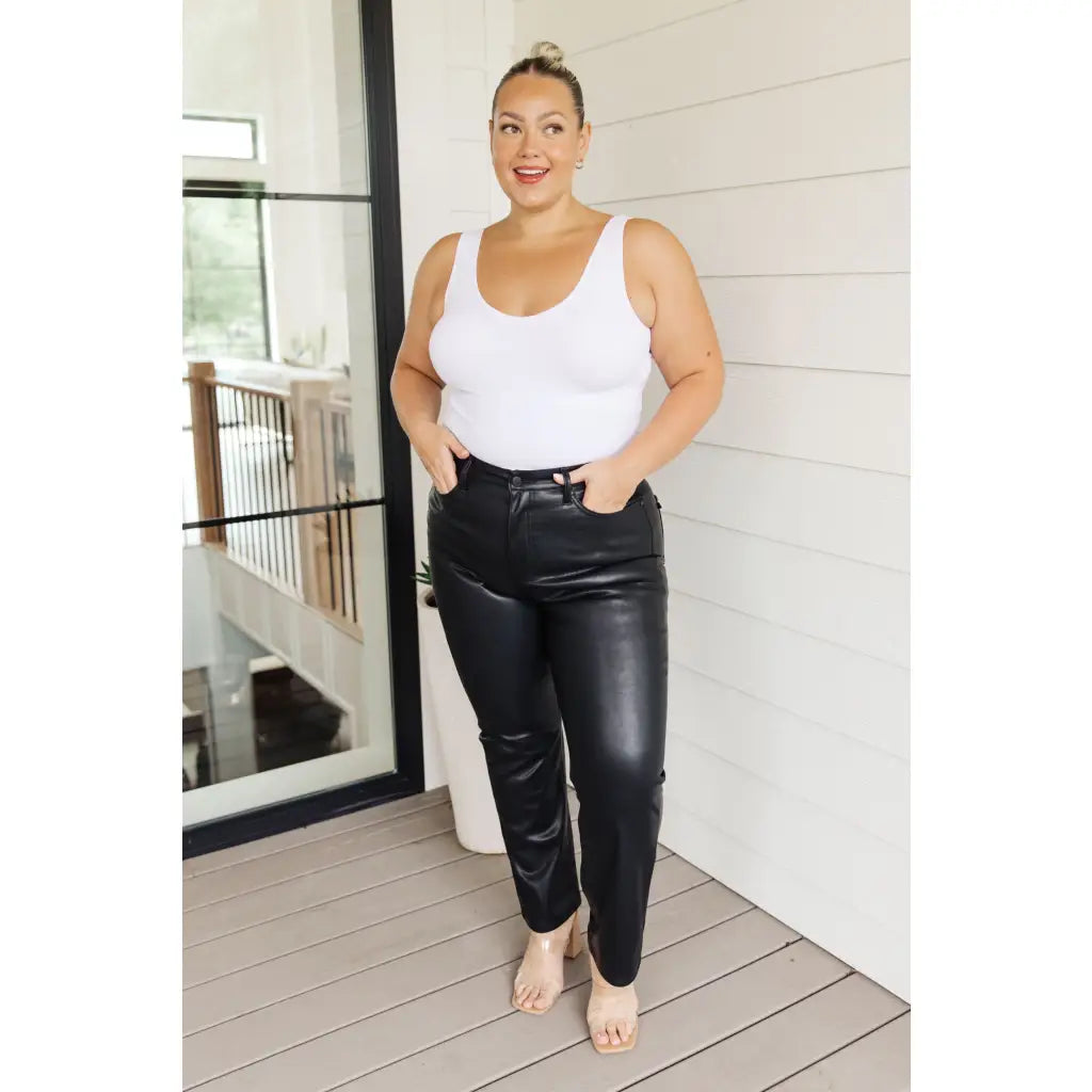 Break the rules with our Faux Black Leather Judy Blue Pants! These high-waisted pants feature tummy control tech