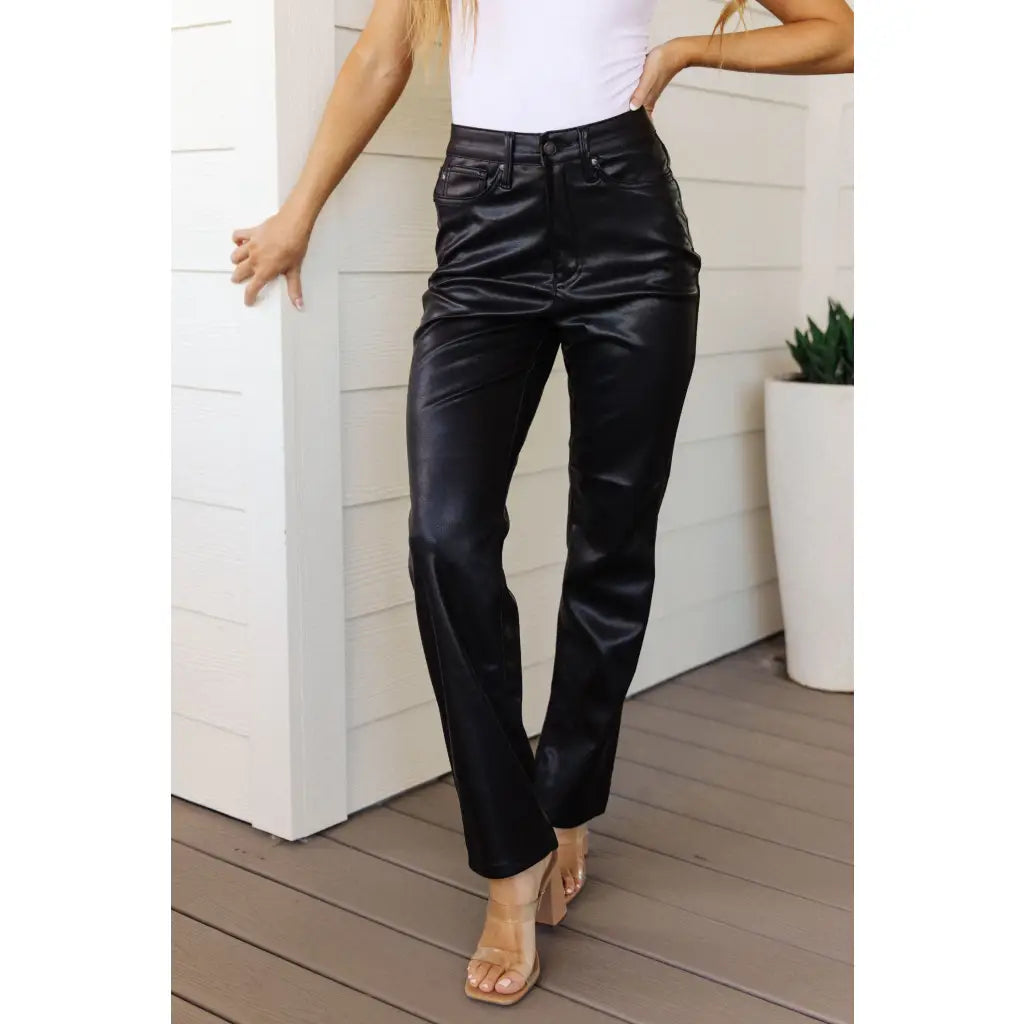 Break the rules with our Faux Black Leather Judy Blue Pants! These high-waisted pants feature tummy control tech