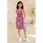 Indulge in effortless style with our Bless Your Heart V-Neck Dress Neon Fuchsia! Made from luxurious stretchy