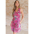 Indulge in effortless style with our Bless Your Heart V-Neck Dress Neon Fuchsia! Made from luxurious stretchy