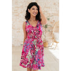 Indulge in effortless style with our Bless Your Heart V-Neck Dress Neon Fuchsia! Made from luxurious stretchy
