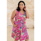 Indulge in effortless style with our Bless Your Heart V-Neck Dress Neon Fuchsia! Made from luxurious stretchy