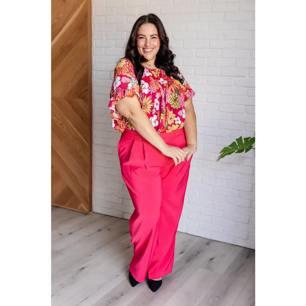 Floral Bulgari knit top with flutter sleeves and a gathered bust. Wrinkle-resistant available in plus sizes up to 3XL