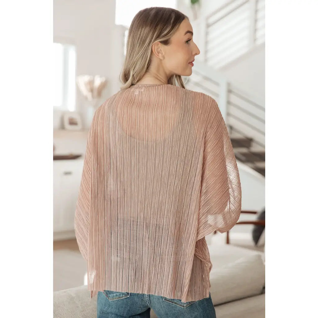 Perfect for party time our Blushing Beige Sheer Kimono is crafted of sheer accordion fabric with lurex thread accents