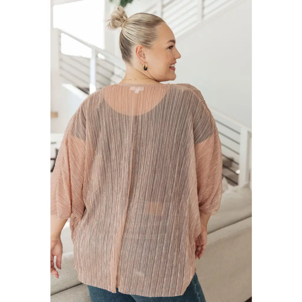 Perfect for party time our Blushing Beige Sheer Kimono is crafted of sheer accordion fabric with lurex thread accents