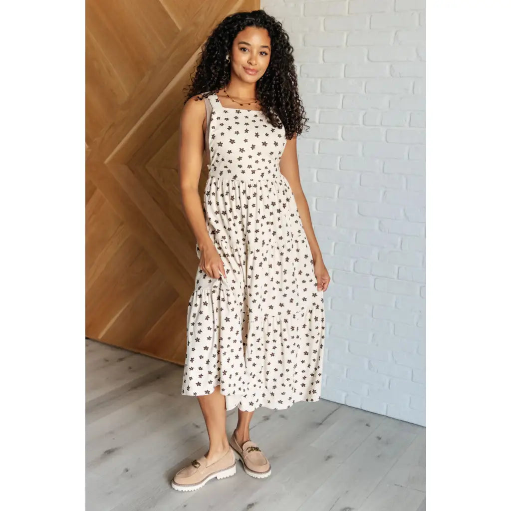 Fall in love with this flowy ivory midi dress featuring pockets adjustable straps and plus size options. A boho-chic