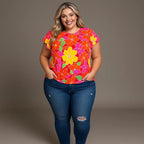 The Bold in Bloom plus size top features soft knit fabric flutter sleeves and a floral print that flatters. Sweet comfy