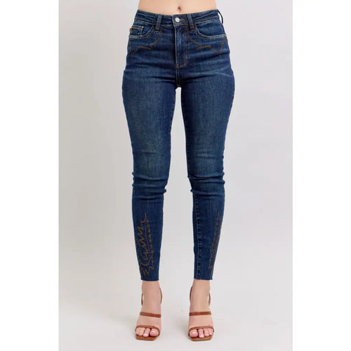 Dark wash Skinny Judy Blue jeans with boot stitch embroidery and high rise fit—chic comfy made to flatter every shape.