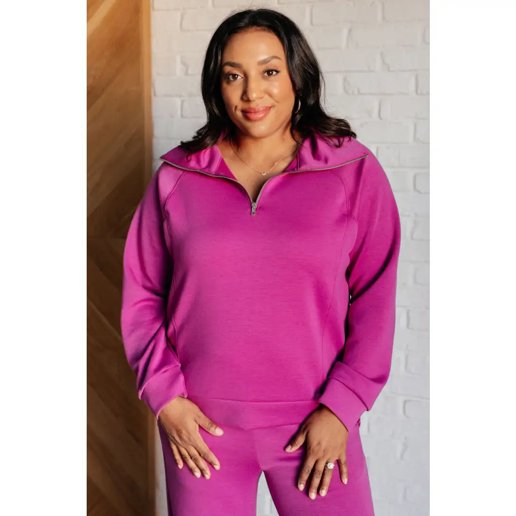 Stay stylish on the go with our Boujee Basic Travel Zip Pullover in Magenta. Wrinkle-resistant cozy and available plus