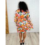 Make a statement in the Bow-dly Go V-Neck Floral Mini Dress. A bold playful vibrant boutique dress buttery soft fabric