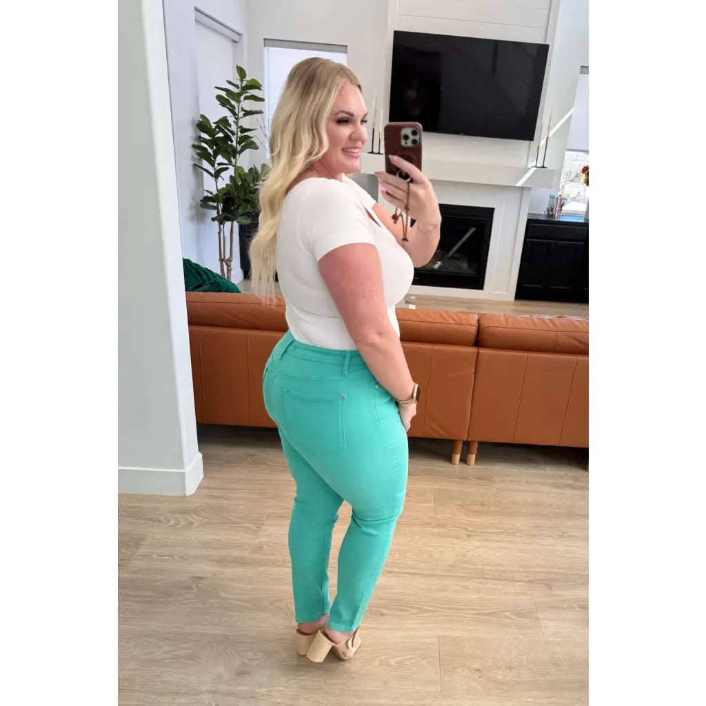 Get ready to make a splash with our Bridgette High Rise Garment Dyed Slim Jeans from Judy Blue! With high rise and slim