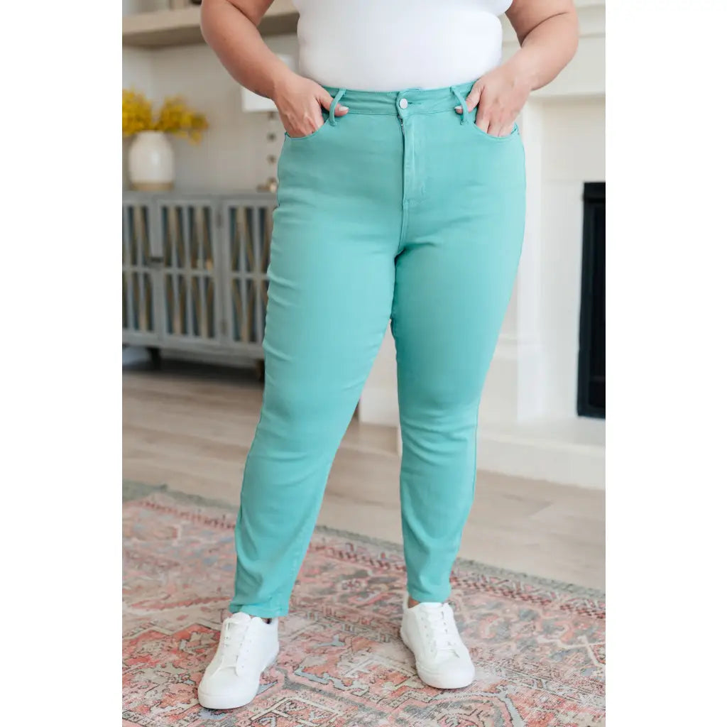 Get ready to make a splash with our Bridgette High Rise Garment Dyed Slim Jeans from Judy Blue! With high rise and slim