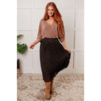 Meet our Bronzed Daze Draped V-Neck Blouse! This gorgeous top is constructed from a slinky and shimmering bronze ribbed