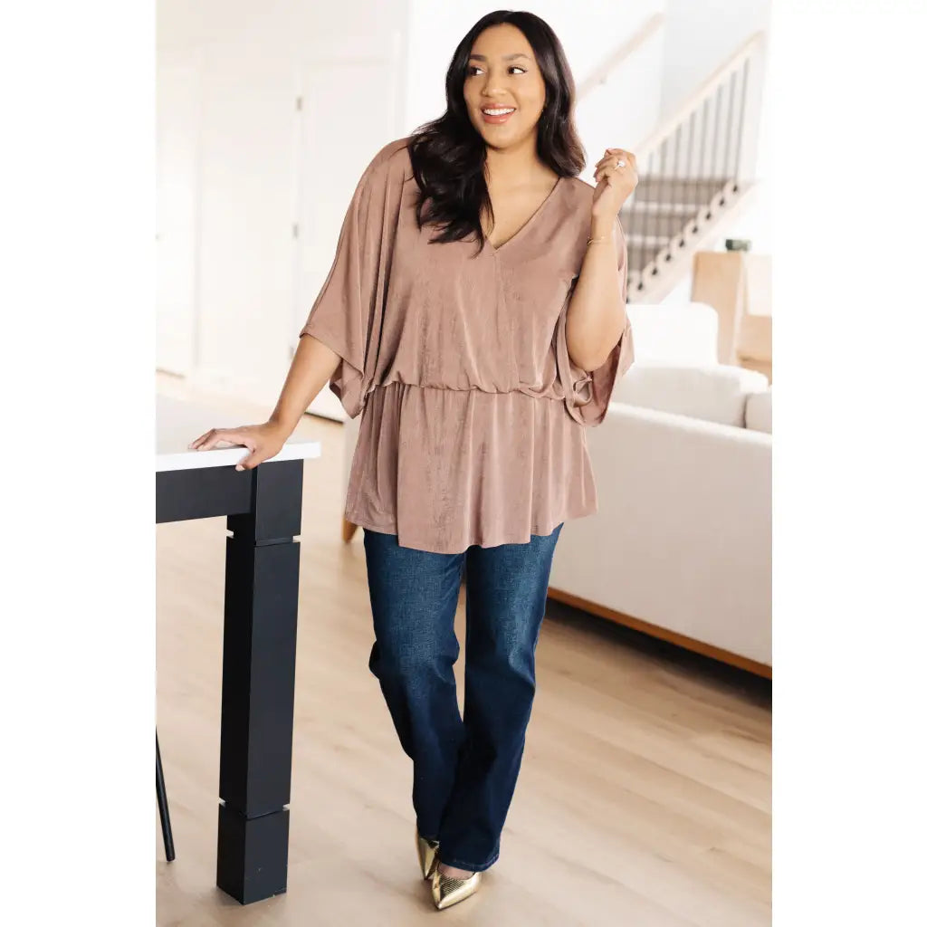 Meet our Bronzed Daze Draped V Neck Blouse! This gorgeous top is constructed from a slinky and shimmering bronze ribbed
