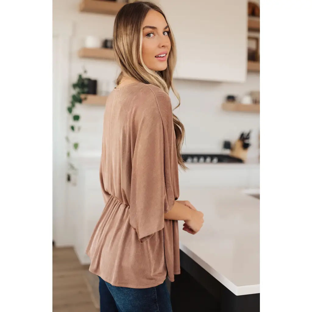 Meet our Bronzed Daze Draped V Neck Blouse! This gorgeous top is constructed from a slinky and shimmering bronze ribbed