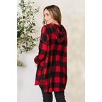 Our Buffalo Plaid Hooded Shirt is a versatile and stylish addition to any wardrobe. With its combination of classic red