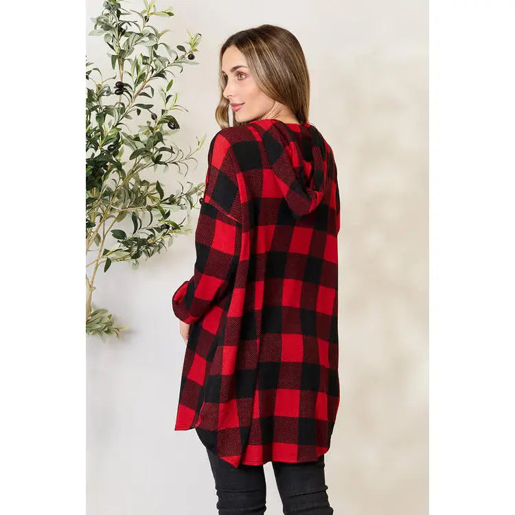 Our Buffalo Plaid Hooded Shirt is a versatile and stylish addition to any wardrobe. With its combination of classic red