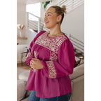 Magenta embroidered blouse with floral details. Flowy feminine and available in plus sizes for the perfect boutique fit.