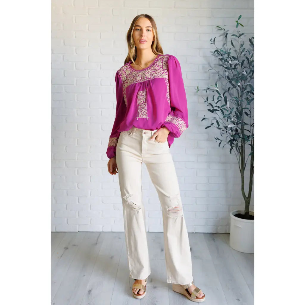 Magenta embroidered blouse with floral details. Flowy feminine and available in plus sizes for the perfect boutique fit.