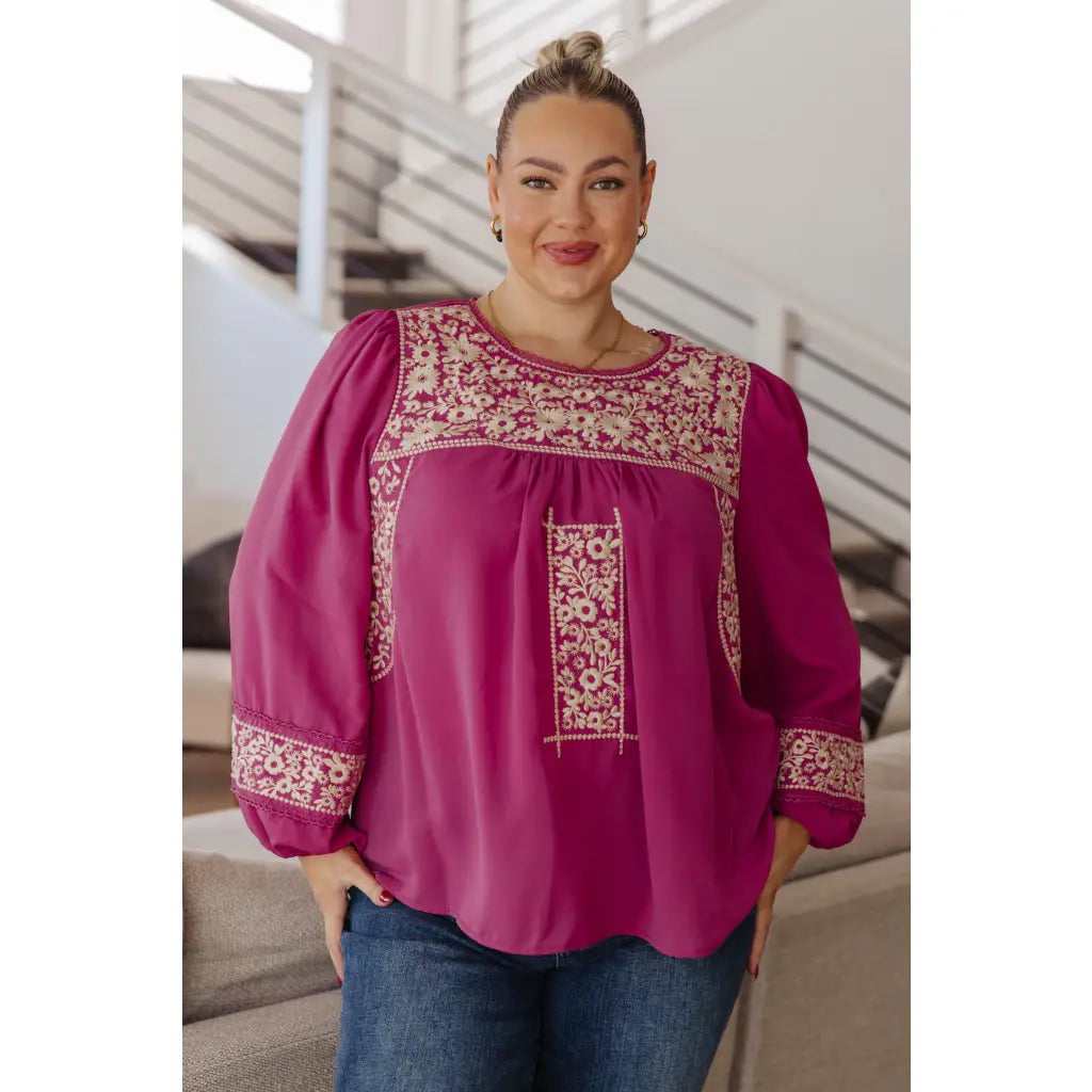 Magenta embroidered blouse with floral details. Flowy feminine and available in plus sizes for the perfect boutique fit.