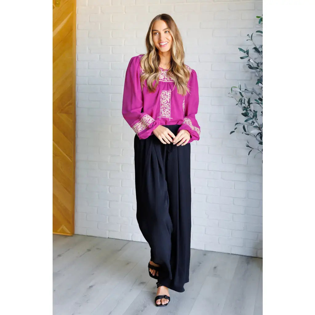 Magenta embroidered blouse with floral details. Flowy feminine and available in plus sizes for the perfect boutique fit.