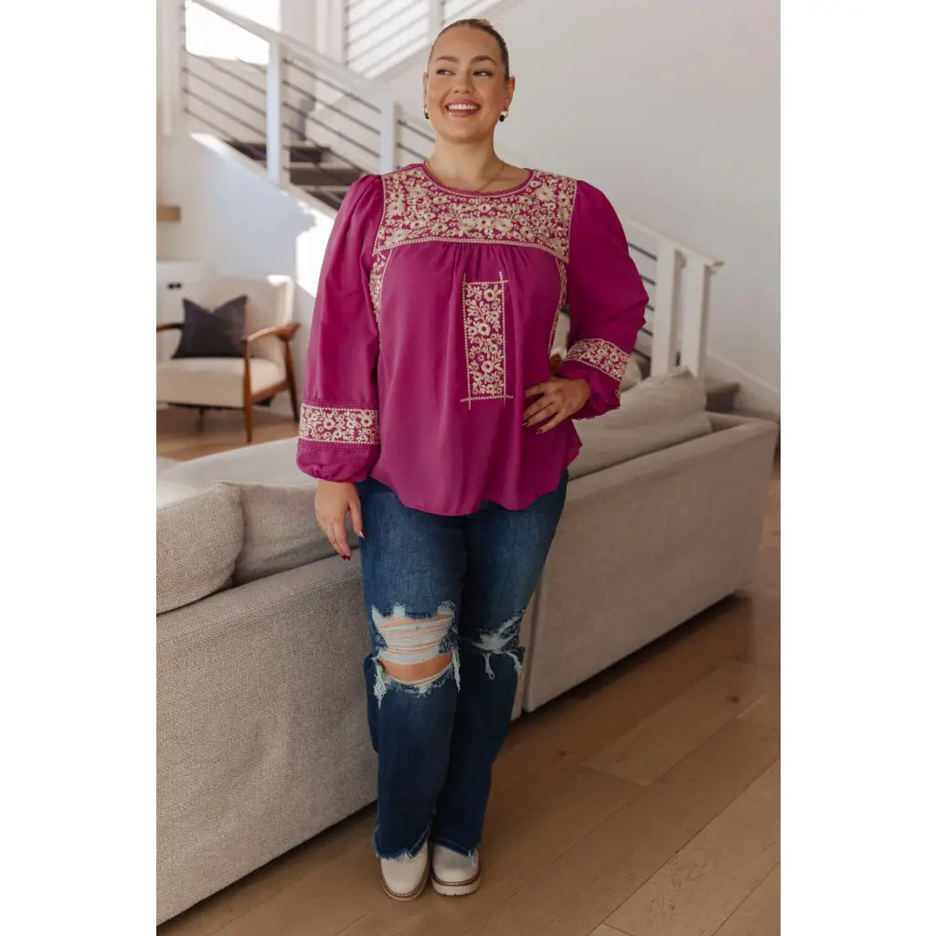 Magenta embroidered blouse with floral details. Flowy feminine and available in plus sizes for the perfect boutique fit.