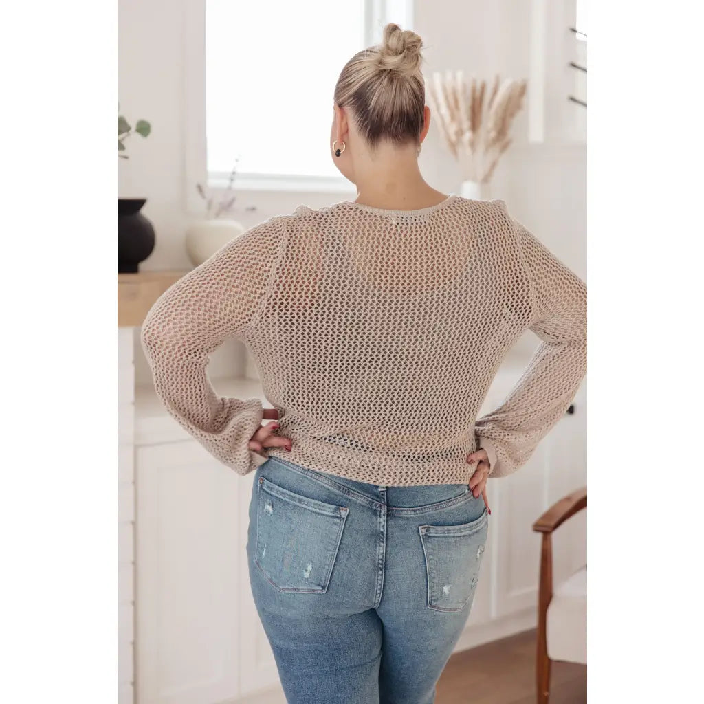Our Calming Down Loose Knit Top in Beige offers lightweight comfort with its sheer layer and relaxed fit. Designed