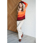 Our Candy Corn Color Block Wide Striped Sweater features a round neckline that adds touch of charm while the drop