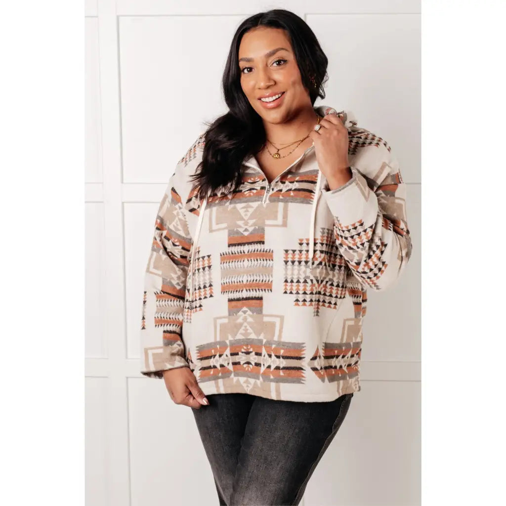 Our Caramel and Mocha Aztec Print Hoodie features a thick woven off-white brushed flannel with cozy print hooded 1/2