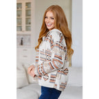 Our Caramel and Mocha Aztec Print Hoodie features a thick woven off-white brushed flannel with cozy print hooded 1/2
