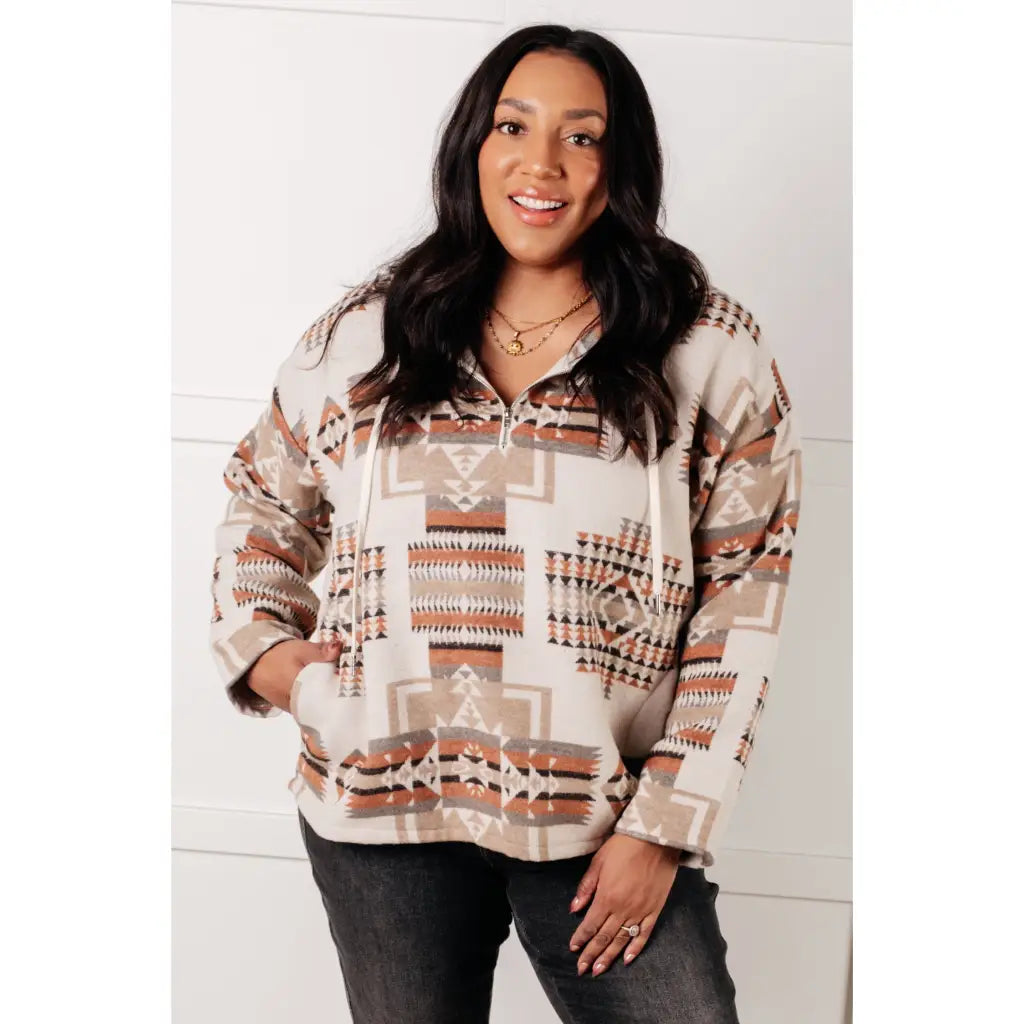 Our Caramel and Mocha Aztec Print Hoodie features a thick woven off-white brushed flannel with cozy print hooded 1/2