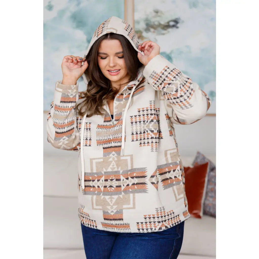 Our Caramel and Mocha Aztec Print Hoodie features a thick woven off-white brushed flannel with cozy print hooded 1/2