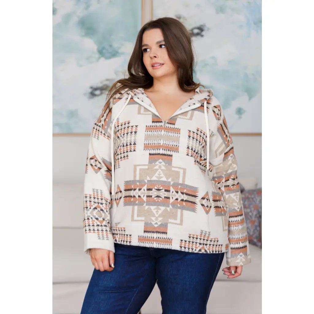 Our Caramel and Mocha Aztec Print Hoodie features a thick woven off-white brushed flannel with cozy print hooded 1/2