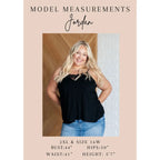 Our Caramel Feelings Boatneck Sweater features a wide boat neckline and dropped shoulder chest pocket that gives