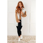 Our Caramel Feelings Boatneck Sweater features a wide boat neckline and dropped shoulder chest pocket that gives