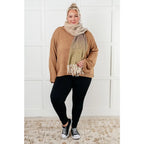 Our Caramel Feelings Boatneck Sweater features a wide boat neckline and dropped shoulder chest pocket that gives