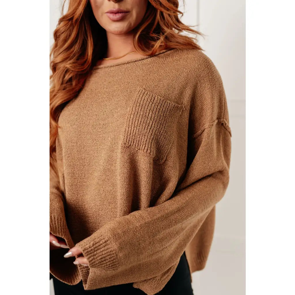 Our Caramel Feelings Boatneck Sweater features a wide boat neckline and dropped shoulder chest pocket that gives