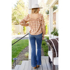 It’s easy to look cute and on trend in our Caramel Fall Gingham Plaid! This adorable top features an elasticated