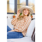 It’s easy to look cute and on trend in our Caramel Fall Gingham Plaid! This adorable top features an elasticated