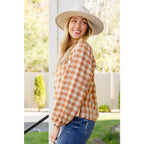 It’s easy to look cute and on trend in our Caramel Fall Gingham Plaid! This adorable top features an elasticated