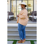 It’s easy to look cute and on trend in our Caramel Fall Gingham Plaid! This adorable top features an elasticated