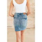 This stylish Carol High Rise Rigid Magic Denim Skirt by Judy Blue is the perfect addition to your wardrobe!