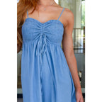 Feel the southern breeze in our Carolina My Mind Midi Dress! This lightweight denim dress features a smocked bust line